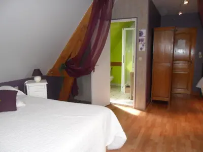 Un ou plusieurs lits dans un hébergement de l'établissement Chambre Du Panorama