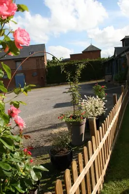 Jardin de l'établissement Gîte à la Ferme des Rooses