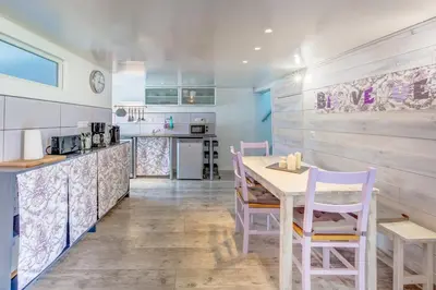 Cuisine ou kitchenette dans l'établissement Gîte à la Ferme des Rooses