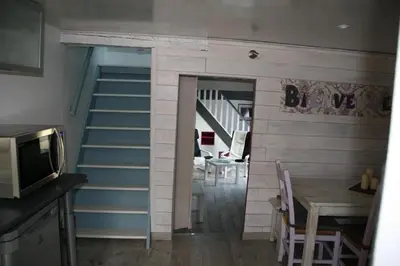Télévision ou salle de divertissement dans l'établissement Gîte à la Ferme des Rooses