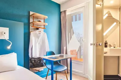 Un ou plusieurs lits dans un hébergement de l'établissement ibis budget Saint-Ouen-l'Aumône