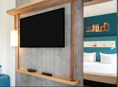 Télévision ou salle de divertissement dans l'établissement ibis budget Saint-Ouen-l'Aumône