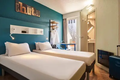 Un ou plusieurs lits dans un hébergement de l'établissement ibis budget Saint-Ouen-l'Aumône