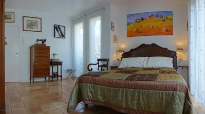 Un ou plusieurs lits dans un hébergement de l'établissement Chambre D'Hôtes le Phenix