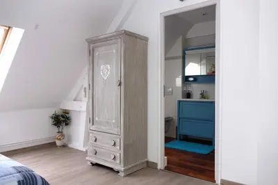 Un ou plusieurs lits dans un hébergement de l'établissement Chambre D'Hôtes le Phenix