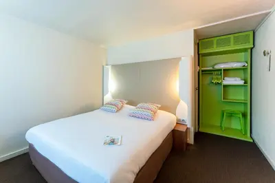 Un ou plusieurs lits dans un hébergement de l'établissement Campanile Rouen Sud - Zénith - Parc Expo