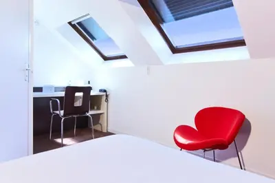 Un ou plusieurs lits dans un hébergement de l'établissement KYRIAD ROUEN NORD - Mont Saint Aignan