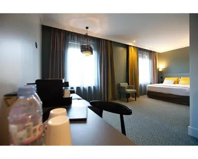 Un ou plusieurs lits dans un hébergement de l'établissement Best Western Plus Hotel de Dieppe 1880