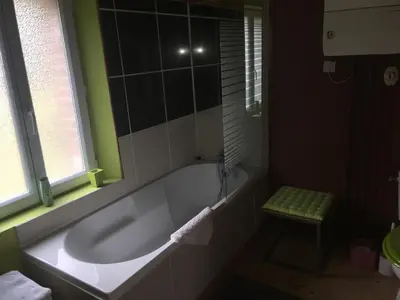 Salle de bains dans l'établissement Pavillon Grosfy