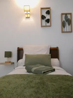 Un ou plusieurs lits dans un hébergement de l'établissement Le Gîte du Chêne Rouvre