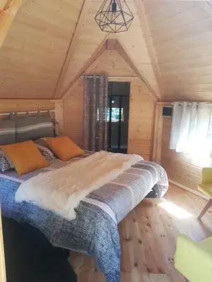 Un ou plusieurs lits dans un hébergement de l'établissement Camping Loisirs Des Groux