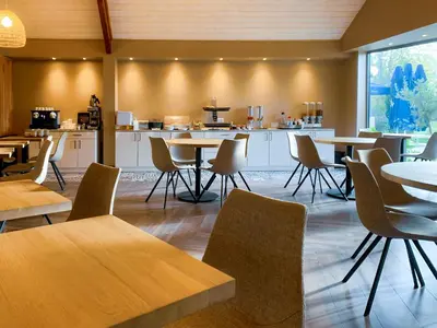 Coin salon dans l'établissement Logis Clermotel - Hôtel & Restaurant