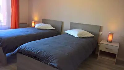 Un ou plusieurs lits dans un hébergement de l'établissement Baie de Somme Abbeville Appart