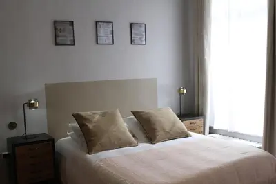 Un ou plusieurs lits dans un hébergement de l'établissement Une maison en ville Hypercentre - Spa