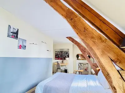 Un ou plusieurs lits dans un hébergement de l'établissement Château Corneille