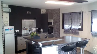 Cuisine ou kitchenette dans l'établissement Loftcosy Friville