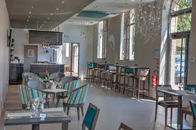 Restaurant ou autre lieu de restauration dans l'établissement Hôtel de la Tabletterie