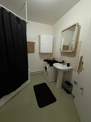 Cuisine ou kitchenette dans l'établissement Appartements Sully