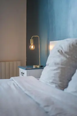 Un ou plusieurs lits dans un hébergement de l'établissement charming city center flat