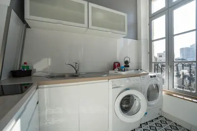 Cuisine ou kitchenette dans l'établissement charming city center flat