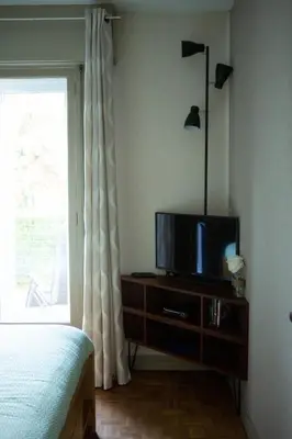 Télévision ou salle de divertissement dans l'établissement Les Terrasses sur Seine