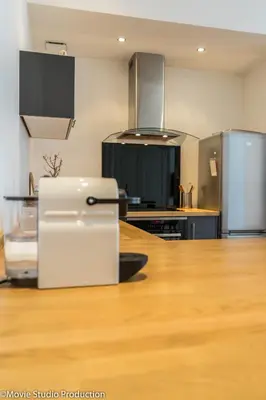 Cuisine ou kitchenette dans l'établissement Charming Haussmannien 50m2 - city center