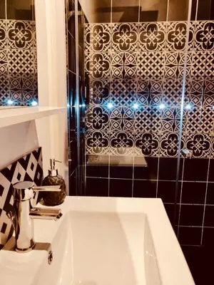 Salle de bains dans l'établissement Le 3 fuscien