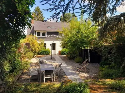 Jardin de l'établissement Au Refuge Des 3 Ours - Chambres d'hôtes et cabanes