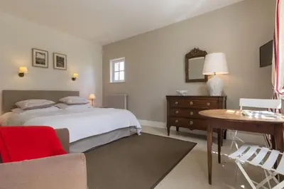 Un ou plusieurs lits dans un hébergement de l'établissement Chambre d'hotes de la Vallee