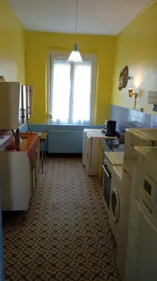 Cuisine ou kitchenette dans l'établissement La Roseraie de Gamaches