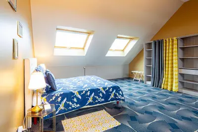 Un ou plusieurs lits dans un hébergement de l'établissement Maison Longuevie