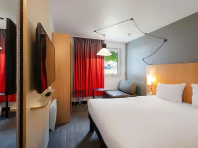 Un ou plusieurs lits dans un hébergement de l'établissement ibis Cergy Pontoise Le Port
