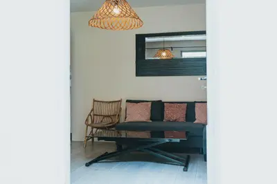 Coin salon dans l'établissement Appartement deux pièces bord de mer avec jardin