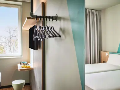 Un ou plusieurs lits dans un hébergement de l'établissement Ibis Budget Cergy St Christophe