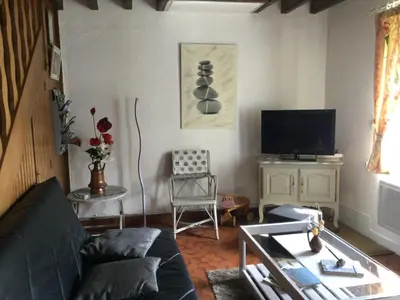 Télévision ou salle de divertissement dans l'établissement Ma petite normande