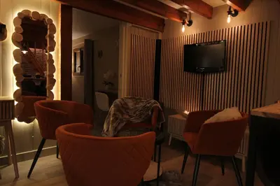 Télévision ou salle de divertissement dans l'établissement Le clos des charmelines