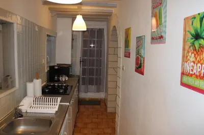 Cuisine ou kitchenette dans l'établissement Ma petite Neuvillaise