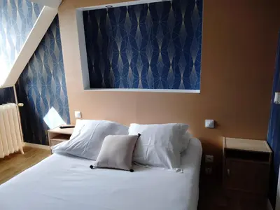 Un ou plusieurs lits dans un hébergement de l'établissement Hotel Central Anzac