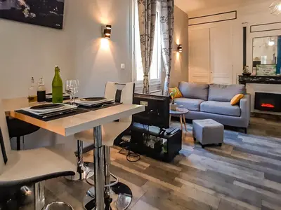 Coin salon dans l'établissement Cosy'Appart - COEUR DE SEINE