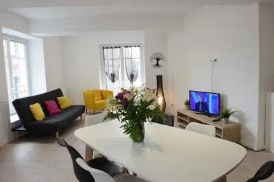 Télévision ou salle de divertissement dans l'établissement L'Échappée Belle