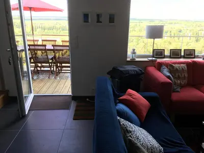 Coin salon dans l'établissement VUE SEINE Chambre Panorama