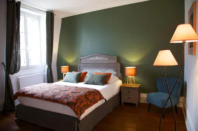 Un ou plusieurs lits dans un hébergement de l'établissement La bohème - Chambres d’hôtes