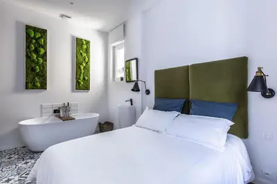 Un ou plusieurs lits dans un hébergement de l'établissement Nuit Zen Rouen - Jacuzzi - Centre Historique