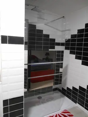 Salle de bains dans l'établissement Au Nid du Thil