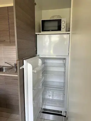 Cuisine ou kitchenette dans l'établissement Gite de la forêt