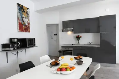 Cuisine ou kitchenette dans l'établissement La Grande Marée