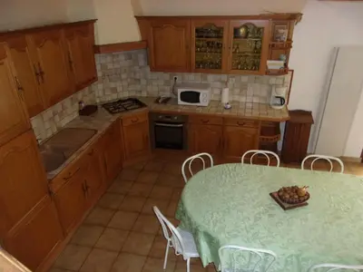 Cuisine ou kitchenette dans l'établissement Gîte à la campagne