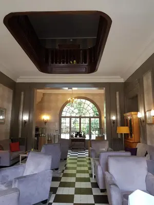 Coin salon dans l'établissement Domaine de Joinville & Spa