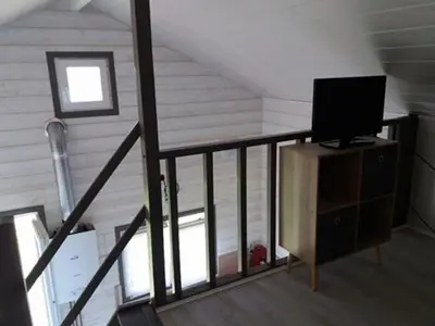 Télévision ou salle de divertissement dans l'établissement Petit Chalet Chez Marcelline