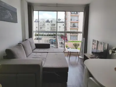 Coin salon dans l'établissement Appart'HomeCity - Rouen Ile Lacroix Seine